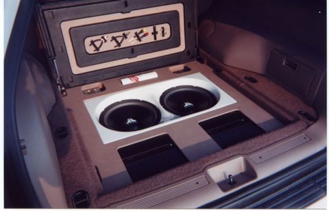 1993 Ford Taurus - Custom car audio system installed in the trunk, subwoofers and amplifiers.