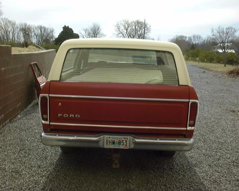 1978 Ford Bronco - This 1978 Ford Bronco is red with a white removable top and a Tennessee license plate.