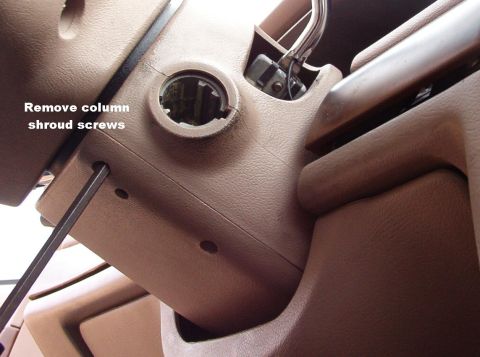 1994 Ford Crown Victoria - Remove the 3 lower shroud screws. It may be necessary to remove the knee bolster to get the fourth (front) one, if it's installed. [url=htt…