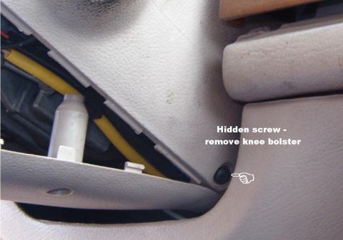 1994 Ford Crown Victoria - If this screw is installed, remove the knee bolster & then the screw.