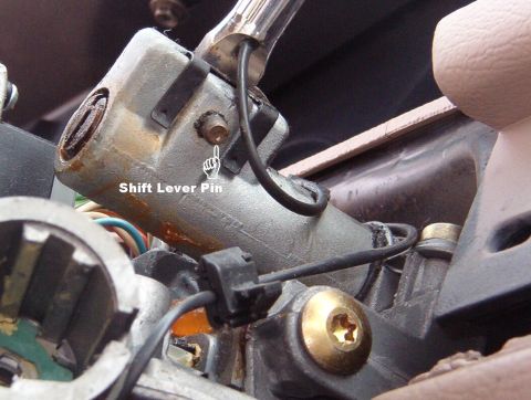 1994 Ford Crown Victoria - Push the pin out to remove the lever.
