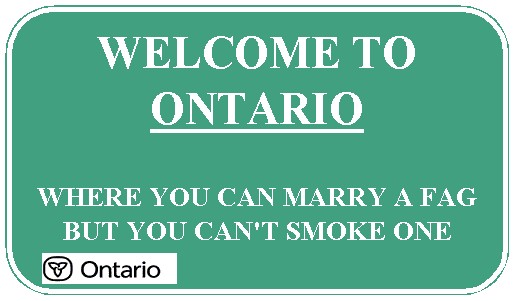 Green sign with white text saying "WELCOME TO ONTARIO" and "WHERE YOU CAN MARRY A FAG BUT YOU CAN'T SMOKE ONE"