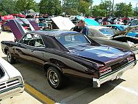 1967 Pontiac Lemans - at a summit racing show, the sun shows the dark cherry paint.