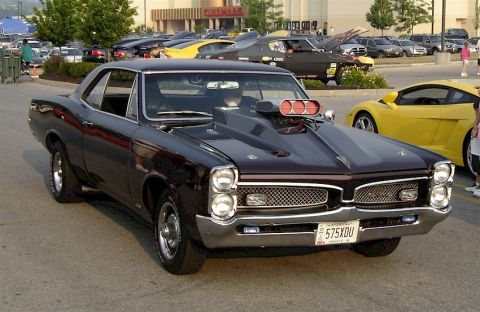 1967 Pontiac Lemans - caught by a sniper pulling into a quaker steak and lube show. [this one is my favorite, and i didn't even take it!]