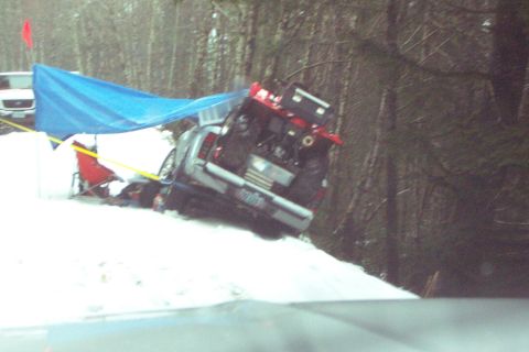 1996 Ford Bronco - Nissan Pick-Up Half Over the Bank He's been here waiting for someone to come along since dawn, it's now about 4PM. (Stuck) (1/28/2006)