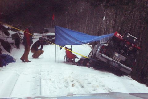 1996 Ford Bronco - Nissan Pick-Up Half Over the Bank He's been here waiting for someone to come along since dawn, it's now about 4PM. (Stuck) (1/28/2006)