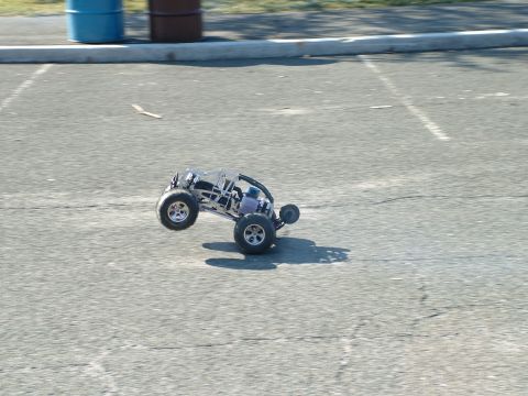 1994 Ford Bronco - This remote control buggy is airborne, with its front wheels off the ground.