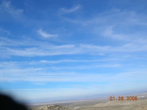 1985 Ford Bronco - A wide view of a desert landscape under a bright blue sky with wispy clouds, dated January 28, 2006.