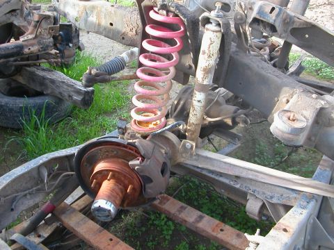 1984 Ford Bronco - This image shows the frame and suspension of a vehicle, not a complete 1984 Ford Bronco.