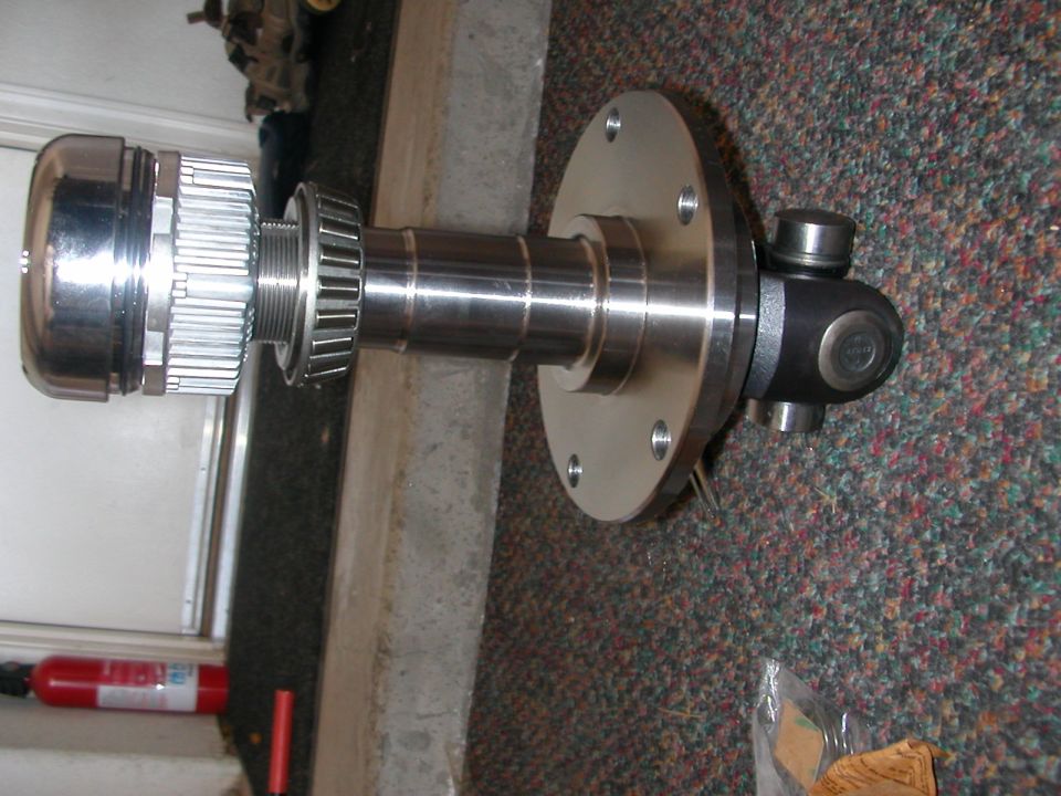 Differential axle assembly with a chrome hub, splined shaft, and U-joint