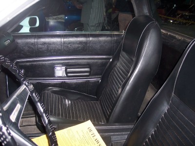 1972 Ford Ranchero - Interior view of a 1972 Ford Ranchero, black vinyl seats and door panels.