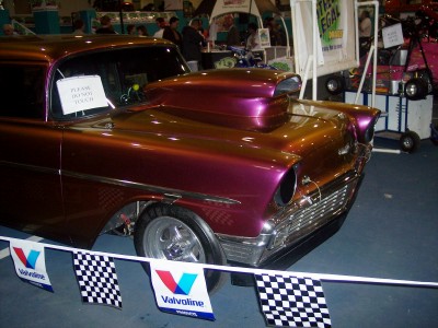 1972 Ford Ranchero - This customized car, likely from the mid-1950s, features a prominent hood scoop and custom paint.