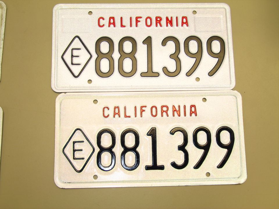Two California license plates reading 881399 with E diamond symbol