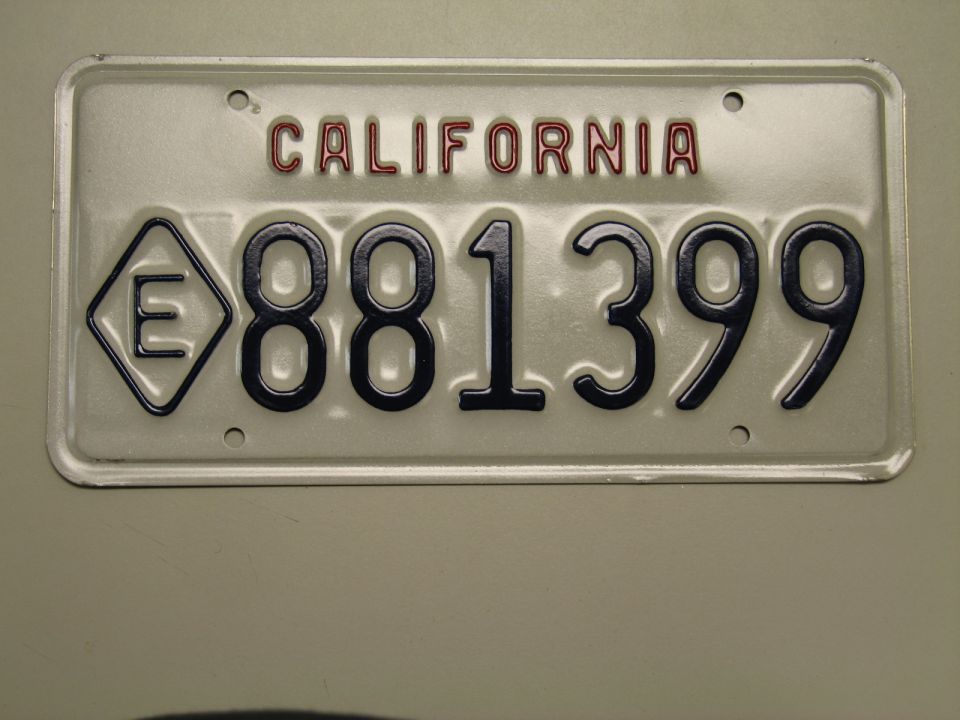 White California license plate reading 881399 with E diamond