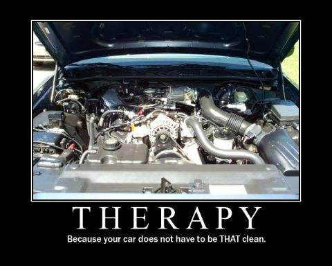 1998 Ford Crown Victoria - Engine bay of a 1998 Ford Crown Victoria, presented as a motivational poster.