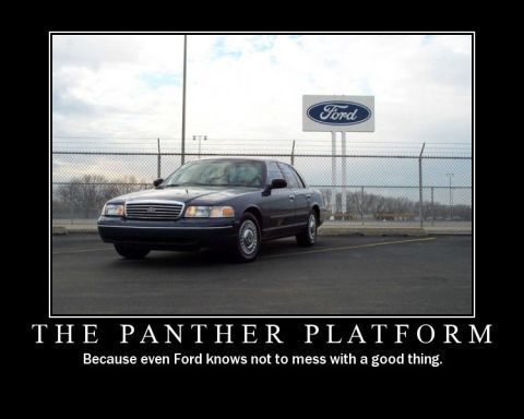 1998 Ford Crown Victoria - 1998 Ford Crown Victoria in a parking lot with a Ford sign overhead.