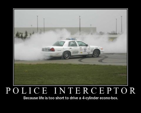 1998 Ford Crown Victoria - A police car performs a burnout, creating a large cloud of smoke. The text 'POLICE INTERCEPTOR' is displayed below.