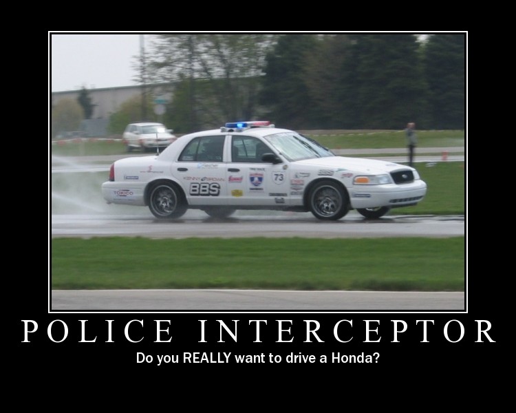 White Ford Crown Victoria with decals and light bar on wet track, side view, motivational poster