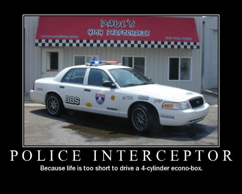 1998 Ford Crown Victoria - Police Interceptor Crown Victoria with aftermarket wheels and decals.