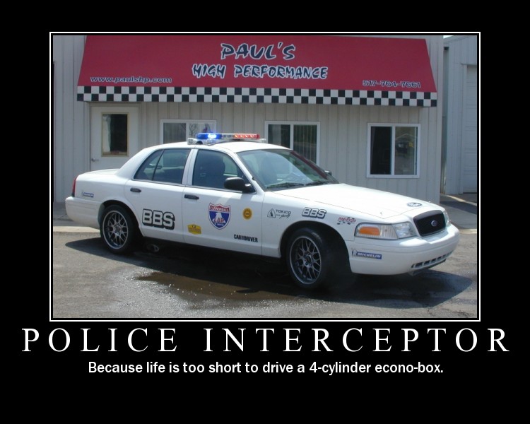 White Ford Crown Victoria police car with light bar and sponsor decals as a meme poster