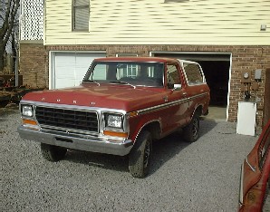 1978 Ford Bronco - This 1978 Ford Bronco is shown in a three-quarter front view, parked outside a garage.