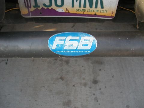 1984 Ford Bronco - A sticker for fullsizebronco.com is affixed to the bumper of a vehicle.