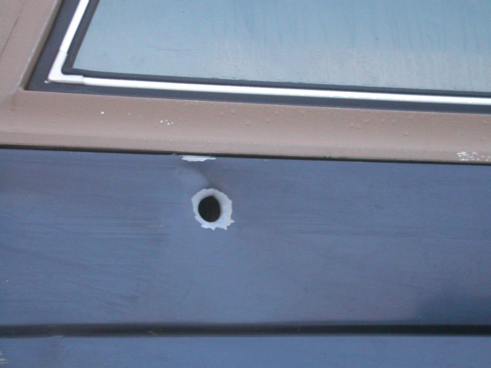 Looking around the service station waiting for a mechanic to show up and fix my fuel pump, I found this Bronco with a big ass bullet hole in it.  Must be a good story there somewhere.