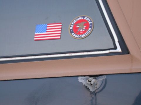 1990 Ford Bronco - But I thought it was even cooler when I walked around the other side of the Bronco and found the exit bullet hole mere inches below an NRA…