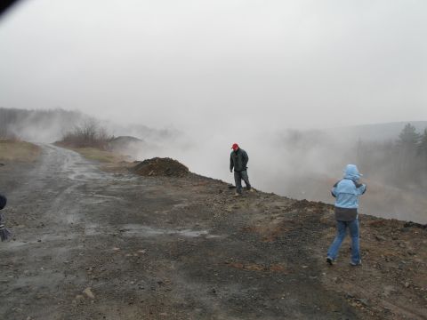 1995 Ford Bronco - A misty, overcast day at Rausch Creek, with two individuals observing the landscape.