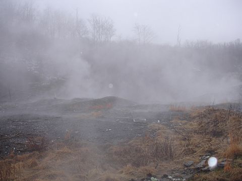 1979 Ford Bronco - A misty scene with steam or fog obscuring the view of a desolate landscape.