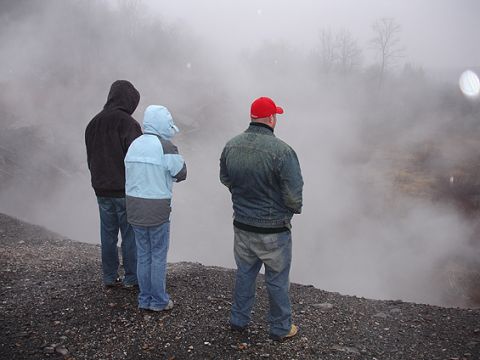 1979 Ford Bronco - People observe a misty, possibly geothermal, landscape.