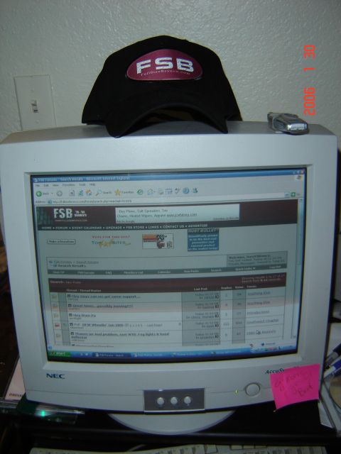 1993 Ford Bronco - A black baseball cap with an FSB logo sits atop a computer monitor displaying a forum website.