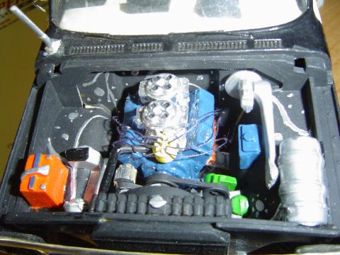 1979 Ford Bronco - Close-up view of a detailed model engine bay, intricate components and wiring.