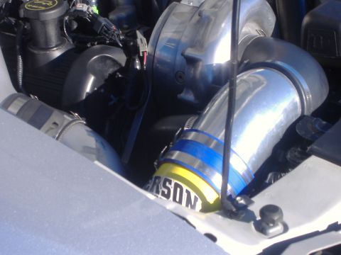2003 Ford Mustang - Custom intake piping visible in the engine bay, with visible text 'ERSON'.