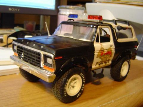 1979 Ford Bronco - This model depicts a 1979 Ford Bronco modified as a police vehicle, complete with light bar and decals.