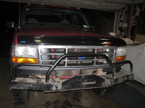 1995 Ford Bronco - The grille and headlight design indicate this is a 1992-1997 Ford F-Series truck, not a 1995 Bronco.