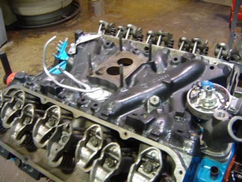 1979 Ford Bronco - Close-up view of an engine block, likely undergoing a rebuild or repair.