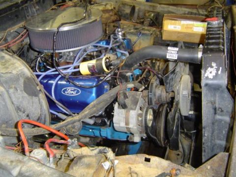 1979 Ford Bronco - Engine bay details showing a Ford V8 motor with various components.