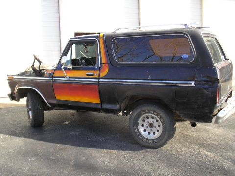1979 Ford Bronco - This Ford Bronco features a distinctive paint scheme and appears to be undergoing some work.