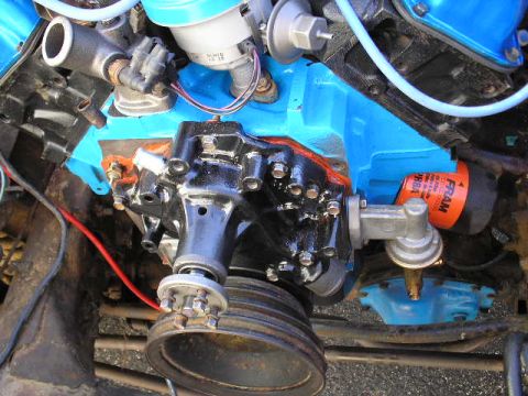 1979 Ford Bronco - Engine components with a blue painted block and an orange Fram oil filter are visible.