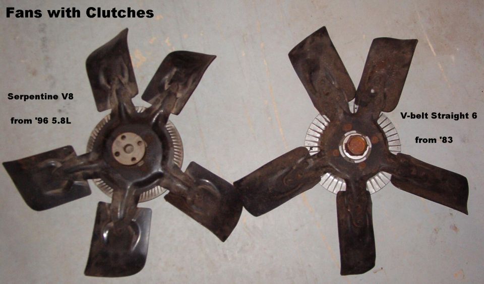 Two rusty engine cooling fans side by side, 5-blade and 6-blade, labeled by engine