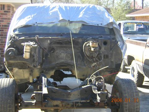 1986 Chevrolet Blazer - 1986 Chevrolet Blazer chassis undergoing work, with another vehicle visible in the background.
