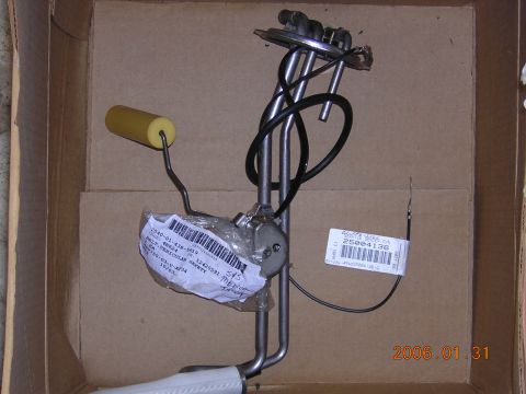 1986 Chevrolet Blazer - A new fuel sending unit is shown inside its shipping box, ready for installation.