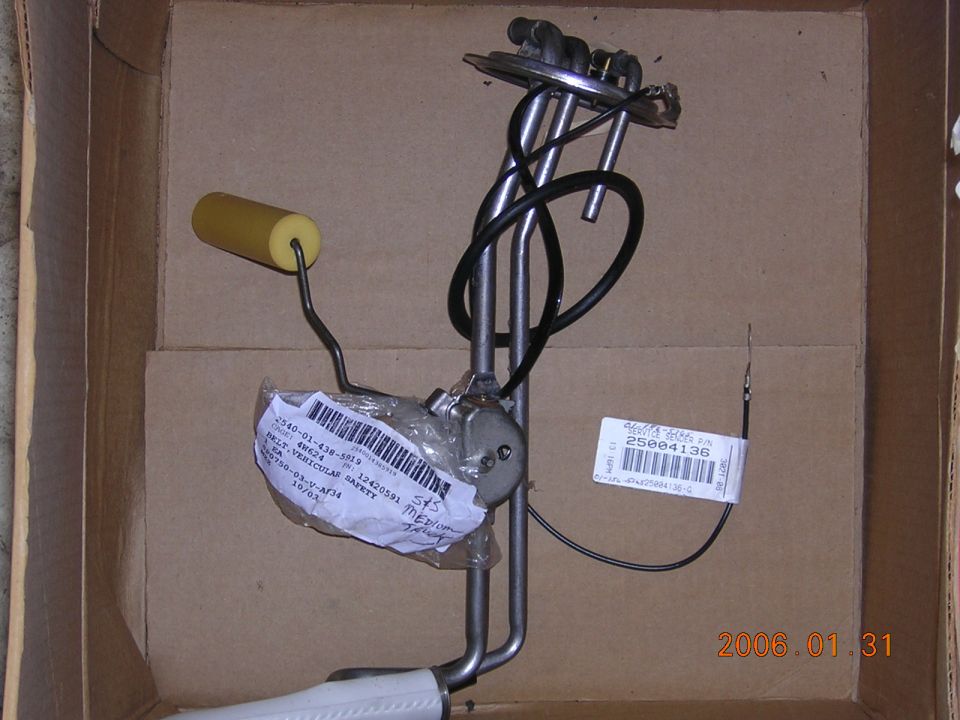 Fuel sending unit in a box. Has a yellow float and some wires