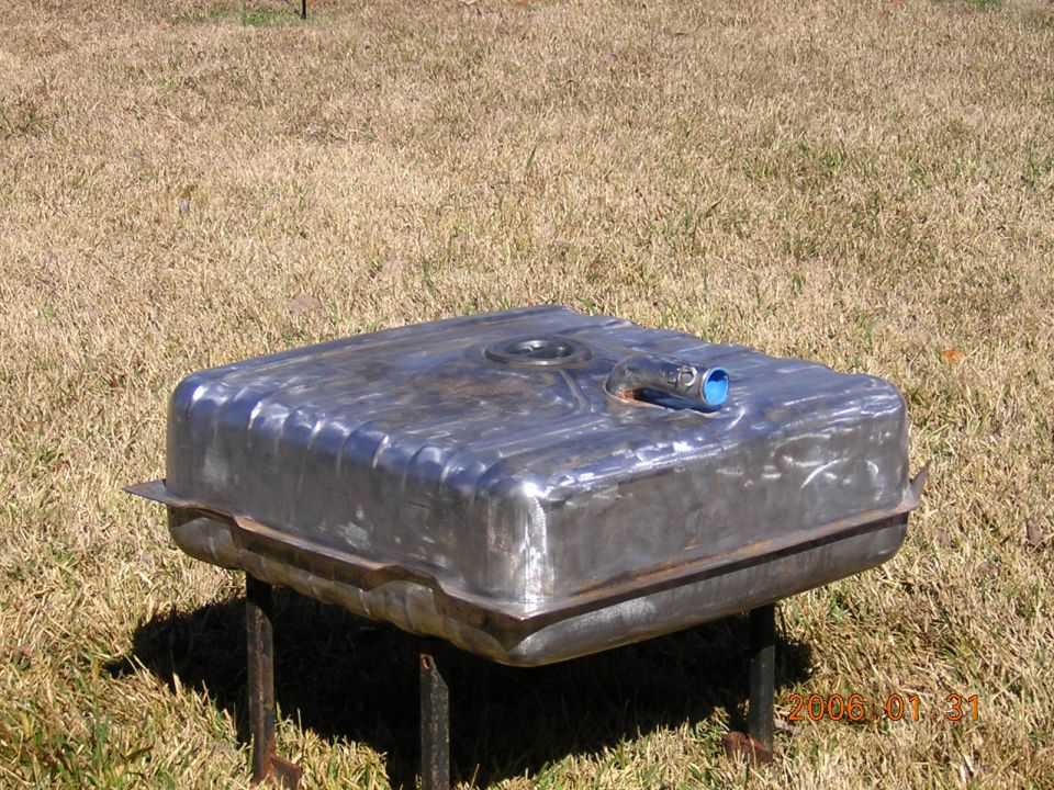 metal fuel tank on stand outdoors