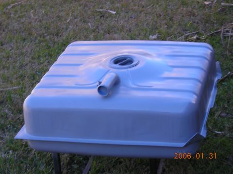 1986 Chevrolet Blazer - A fuel tank is shown outdoors on a grassy surface, with a date stamp and website visible in the corner.