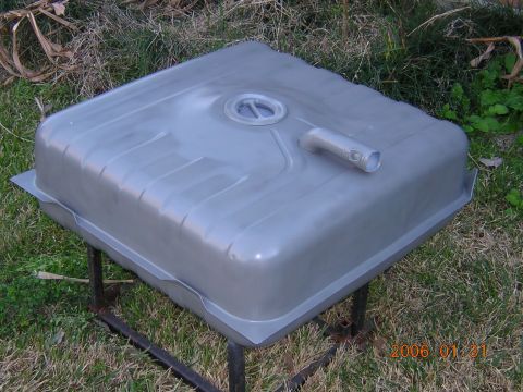1986 Chevrolet Blazer - Fuel tank shown outdoors on a metal stand.