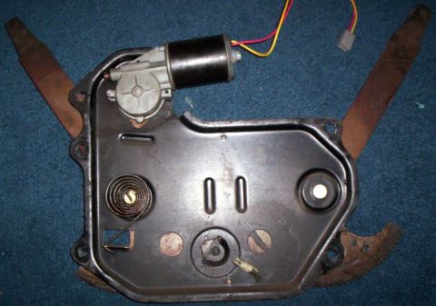 1986 Ford Bronco - This is the backside of the Window Regulator with the Window Motor mounted to it.