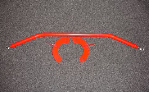 1993 Ford Taurus - Red strut tower brace and mounting brackets on a dark textured surface.