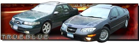 1999 Chrysler 300M - Two sedans, a 1999 Chrysler 300M and another vehicle, are displayed together in this image.